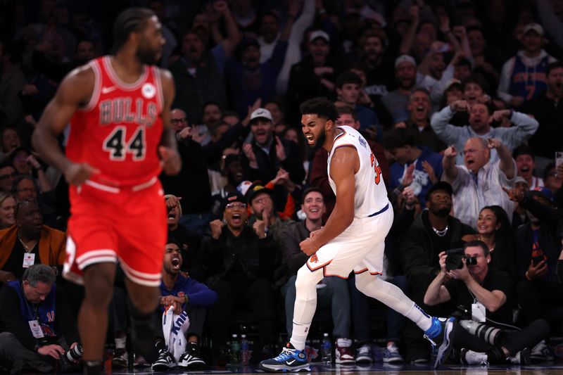 NEW YORK, NEW YORK - NOVEMBER 13: Karl-Anthony Towns #32 of the New York Knicks celebrates after his dunk against the Chicago Bulls during the third quarter at Madison Square Garden on November 13, 2024 in New York City. NOTE TO USER: User expressly acknowledges and agrees that, by downloading and or using this photograph, User is consenting to the terms and conditions of the Getty Images License Agreement. (Photo by Elsa/Getty Images)