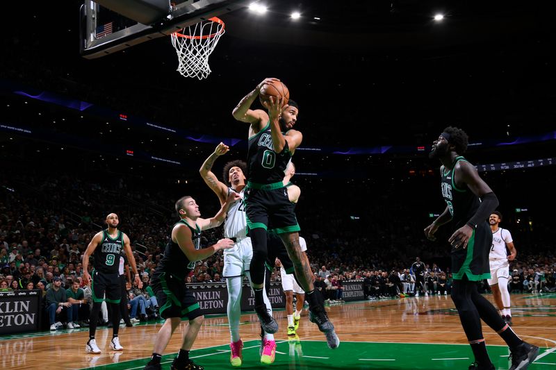 BOSTON, MA - NOVEMBER 8:  Jayson Tatum #0 of the Boston Celtics goes up for the rebound during the game against the Brooklyn Nets on November 8, 2024 at TD Garden in Boston, Massachusetts. NOTE TO USER: User expressly acknowledges and agrees that, by downloading and/or using this Photograph, user is consenting to the terms and conditions of the Getty Images License Agreement. Mandatory Copyright Notice: Copyright 2024 NBAE (Photo by Brian Babineau/NBAE via Getty Images)