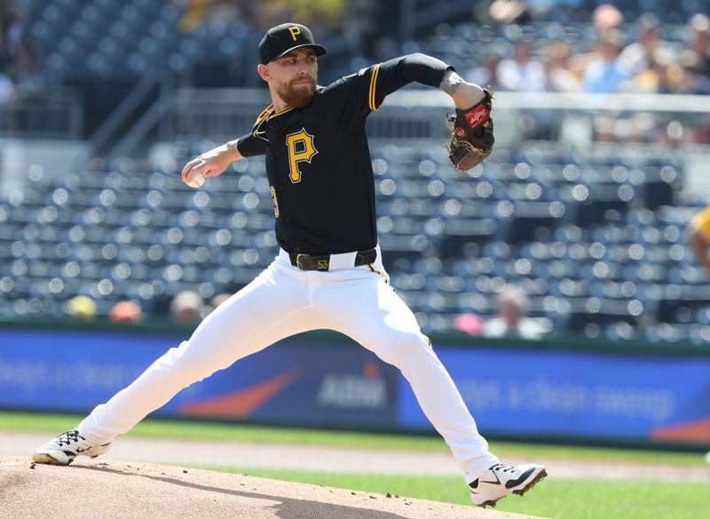Sep 21, 2025; Pittsburgh, Pennsylvania, USA;  Pittsburgh Pirates starting pitcher Mike Burrows (53) delivers a pitch against the Athletics during the first inning at PNC Park. Mandatory Credit: Charles LeClaire-Imagn Images