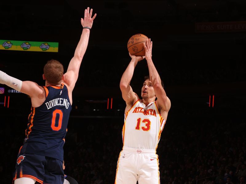 NEW YORK, NY - MARCH 5: Bogdan Bogdanovic #13 of the Atlanta Hawks shoots the ball during the game against the New York Knicks on March 5, 2024 at Madison Square Garden in New York City, New York.  NOTE TO USER: User expressly acknowledges and agrees that, by downloading and or using this photograph, User is consenting to the terms and conditions of the Getty Images License Agreement. Mandatory Copyright Notice: Copyright 2024 NBAE  (Photo by Nathaniel S. Butler/NBAE via Getty Images)