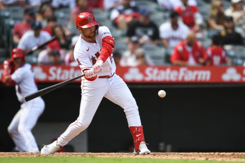 Oct 1, 2023; Anaheim, California, USA; Los Angeles Angels first baseman Brandon Drury (23)  forced out at first base from a double play against the Oakland Athletics during the eighth inning at Angel Stadium. Mandatory Credit: Jonathan Hui-USA TODAY Sports