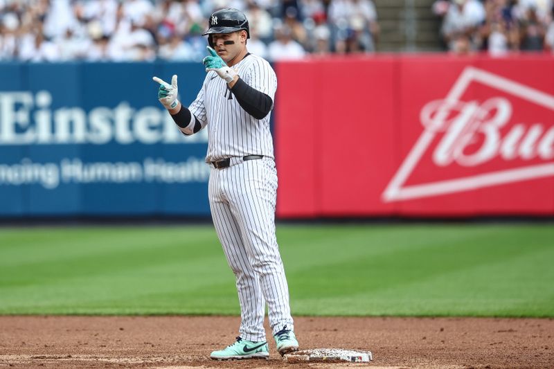 Sep 1, 2024; Bronx, New York, USA;  New York Yankees first baseman Anthony Rizzo (48) gestures after hitting an RBI double in the fifth inning against the St. Louis Cardinals at Yankee Stadium. Mandatory Credit: Wendell Cruz-USA TODAY Sports