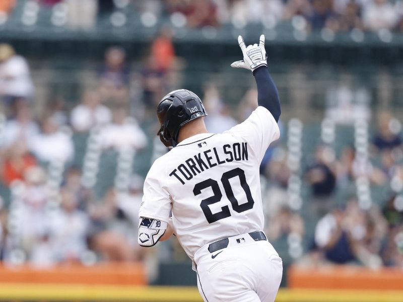 Jun 26, 2025; Detroit, Michigan, USA;  Detroit Tigers first base Spencer Torkelson (20) celebrates after he hits a home run in the first inning against the Athletics at Comerica Park. Mandatory Credit: Rick Osentoski-Imagn Images