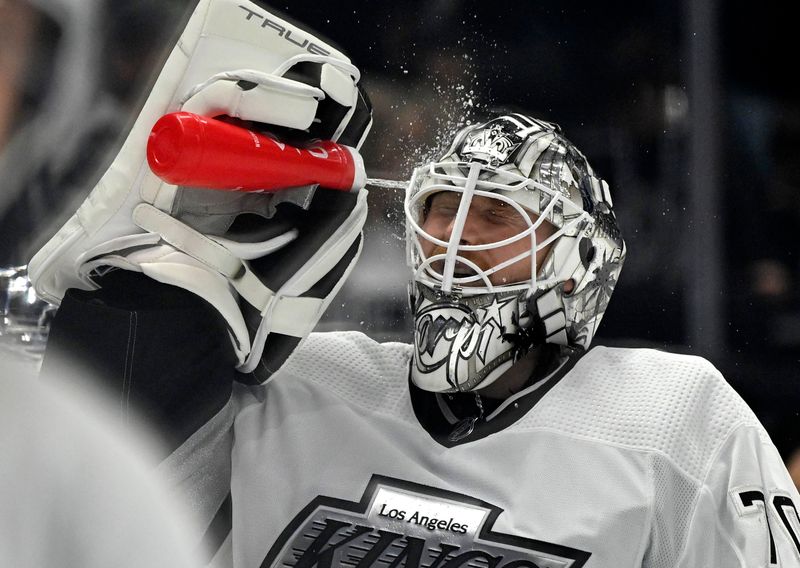 Apr 10, 2023; Los Angeles, California, USA;  Los Angeles Kings goaltender Joonas Korpisalo (70) sprays his face with water at the start of the game against the Vancouver Canucks at Crypto.com Arena. Mandatory Credit: Jayne Kamin-Oncea-USA TODAY Sports