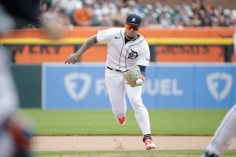 Jul 23, 2023; Detroit, Michigan, USA; Detroit Tigers infielders Javier Baez (28) prepares to catch a ground ball during the seventh inning at Comerica Park. Mandatory Credit: Brian Bradshaw Sevald-USA TODAY Sports