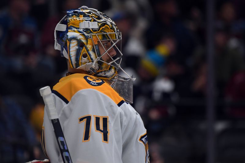 Nov 11, 2024; Denver, Colorado, USA; Nashville Predators goaltender Juuse Saros (74) looks on before the start of the second period against the Colorado Avalanche at Ball Arena. Mandatory Credit: Christopher Hanewinckel-Imagn Images