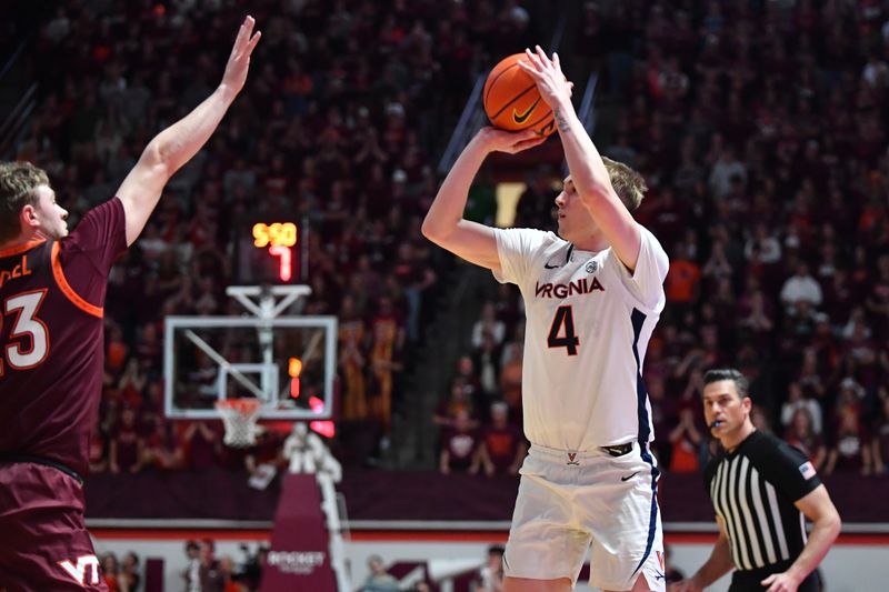 Feb 19, 2024; Blacksburg, Virginia, USA; Virginia Cavaliers guard Andrew Rohde (4) shoots as Virginia Tech Hokies guard Tyler Nickel (23) defends during the first half at Cassell Coliseum. Mandatory Credit: Brian Bishop-USA TODAY Sports