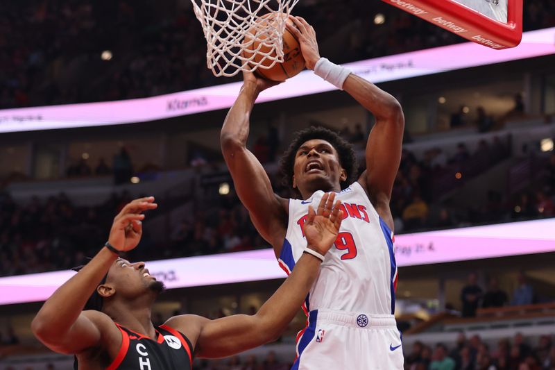 CHICAGO, ILLINOIS - FEBRUARY 27: Ausar Thompson #9 of the Detroit Pistons rebounds the ball against the Chicago Bulls during the first half at the United Center on February 27, 2024 in Chicago, Illinois. NOTE TO USER: User expressly acknowledges and agrees that, by downloading and or using this photograph, User is consenting to the terms and conditions of the Getty Images License Agreement. (Photo by Michael Reaves/Getty Images)