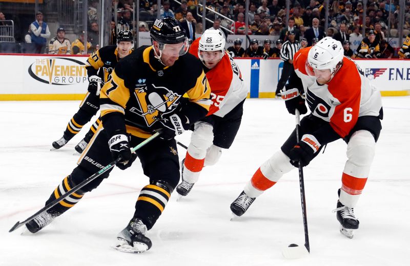 Feb 25, 2024; Pittsburgh, Pennsylvania, USA;  Philadelphia Flyers defenseman Travis Sanheim (6) moves the puck against Pittsburgh Penguins center Jeff Carter (77) during the third period at PPG Paints Arena. Pittsburgh won 7-6.  Mandatory Credit: Charles LeClaire-USA TODAY Sports