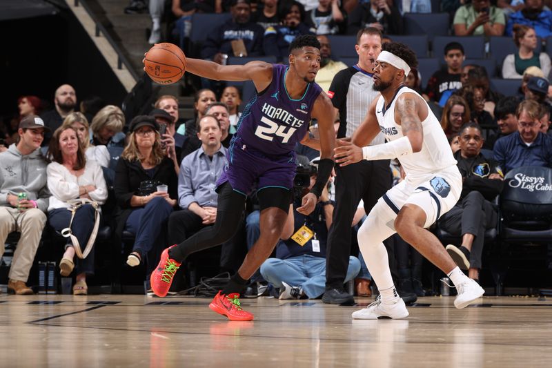 MEMPHIS, TN - MARCH 13: Brandon Miller #24 of the Charlotte Hornets dribbles the ball during the game against the Memphis Grizzlies on March 13, 2024 at FedExForum in Memphis, Tennessee. NOTE TO USER: User expressly acknowledges and agrees that, by downloading and or using this photograph, User is consenting to the terms and conditions of the Getty Images License Agreement. Mandatory Copyright Notice: Copyright 2024 NBAE (Photo by Joe Murphy/NBAE via Getty Images)