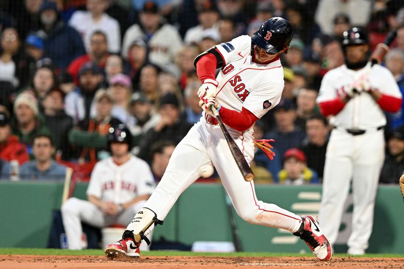 Apr 30, 2024; Boston, Massachusetts, USA; Boston Red Sox left fielder Jarren Duran (16) hits a RBI single against the San Francisco Giants during the second inning at Fenway Park. Mandatory Credit: Brian Fluharty-USA TODAY Sports