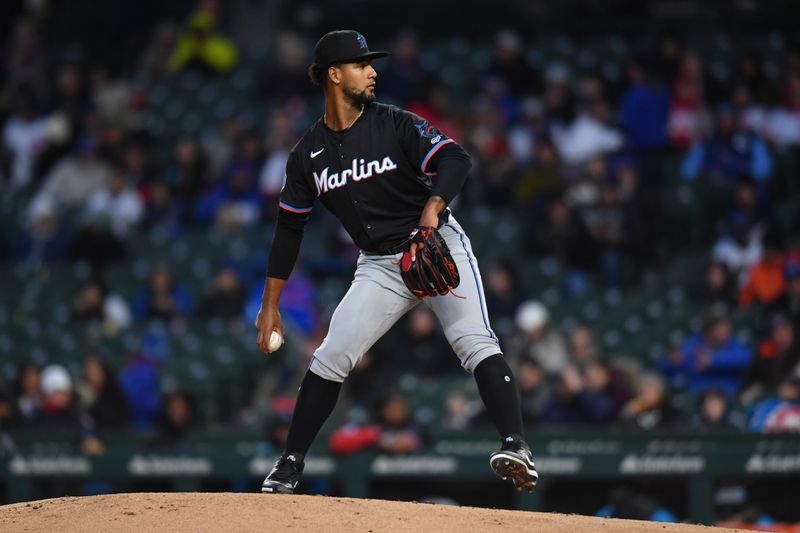 Apr 20, 2024; Chicago, Illinois, USA; Miami Marlins starting pitcher Roddery Munoz (71) pitches in his MLB debut during the second inning against the Chicago Cubs at Wrigley Field. Mandatory Credit: Patrick Gorski-USA TODAY Sports