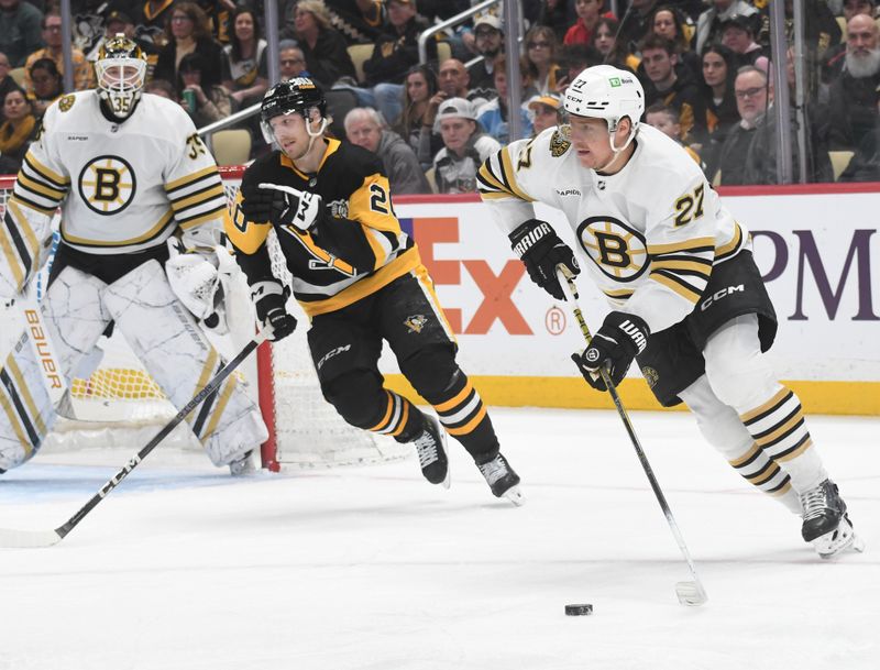 Apr 13, 2024; Pittsburgh, Pennsylvania, USA; Boston Bruins defenseman Hampus Lindholm (27)  moves the puck past Pittsburgh Penguins center Lars Eller (20) during the first period at PPG Paints Arena. Mandatory Credit: Philip G. Pavely-USA TODAY Sports