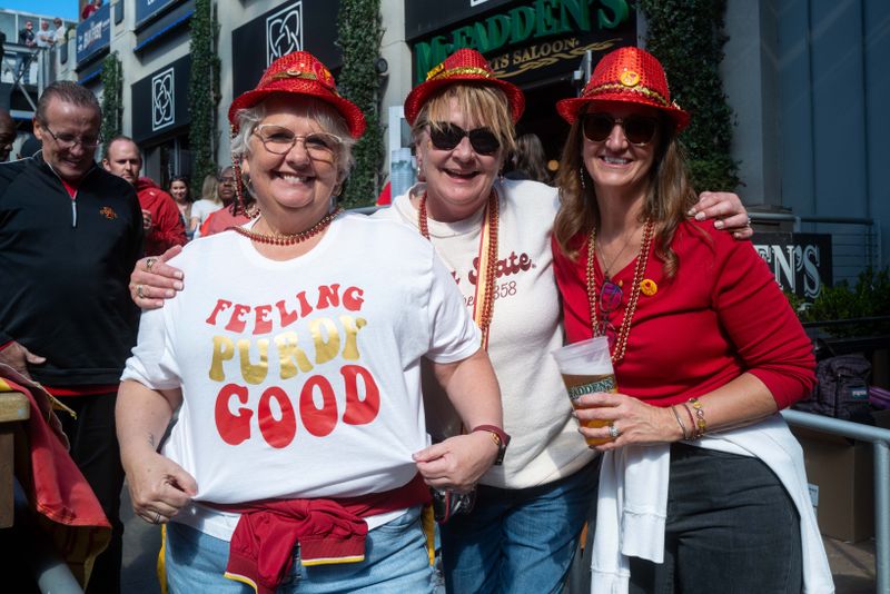 Mar 15, 2024; Kansas City, MO, USA; Iowa State fans enjoy the Big 12 Experience outside the T-Mobile Center. Mandatory Credit: William Purnell-USA TODAY Sports