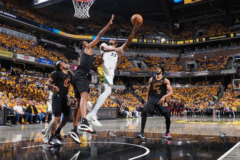 INDIANAPOLIS, IN - MAY 9: Myles Turner #33 of the Indiana Pacers drives to the basket during the game against the Cleveland Cavaliers during Round Two Game Three of the 2025 NBA Playoffs on May 9, 2025 at Gainbridge Fieldhouse in Indianapolis, Indiana. NOTE TO USER: User expressly acknowledges and agrees that, by downloading and or using this Photograph, user is consenting to the terms and conditions of the Getty Images License Agreement. Mandatory Copyright Notice: Copyright 2025 NBAE (Photo by Ron Hoskins/NBAE via Getty Images)