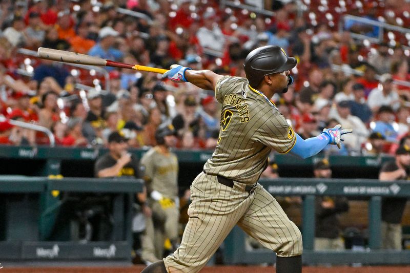 Aug 26, 2024; St. Louis, Missouri, USA;  San Diego Padres second baseman Xander Bogaerts (2) hits a one run sacrifice fly against the St. Louis Cardinals during the fifth inning at Busch Stadium. Mandatory Credit: Jeff Curry-USA TODAY Sports