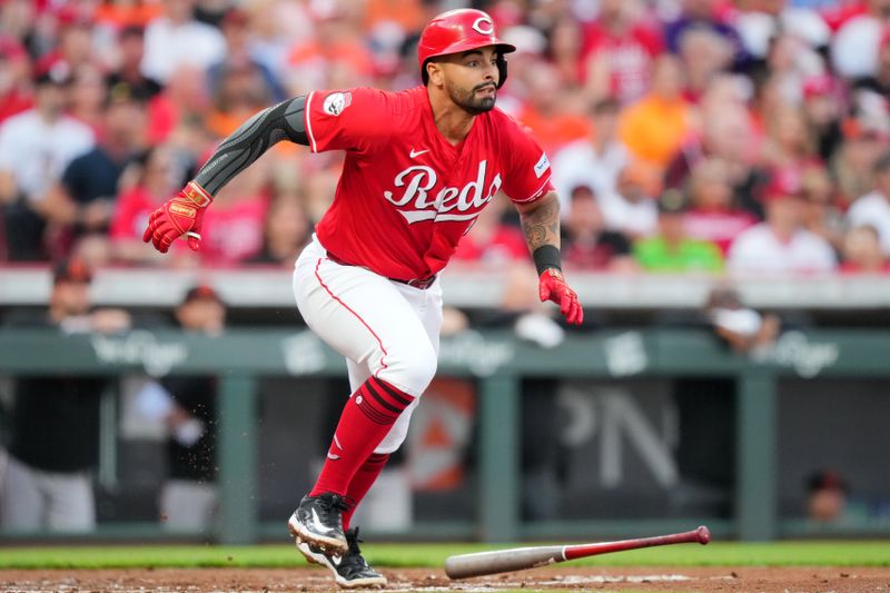 May 4, 2024; Cincinnati, Ohio, USA; Cincinnati Reds first base Christian Encarnacion-Strand (33) sees a fly ball land in short right field for a hit in the second inning of a baseball game against the Baltimore Orioles at Great American Ball Park. Mandatory Credit: The Cincinnati Enquirer-USA TODAY Sports