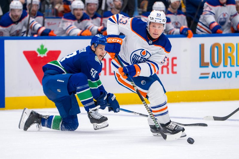 Oct 4, 2024; Vancouver, British Columbia, CAN; Edmonton Oilers forward Jeff Skinner (53) handles the puck against the Vancouver Canucks during the second period at Rogers Arena. Mandatory Credit: Bob Frid-Imagn Images