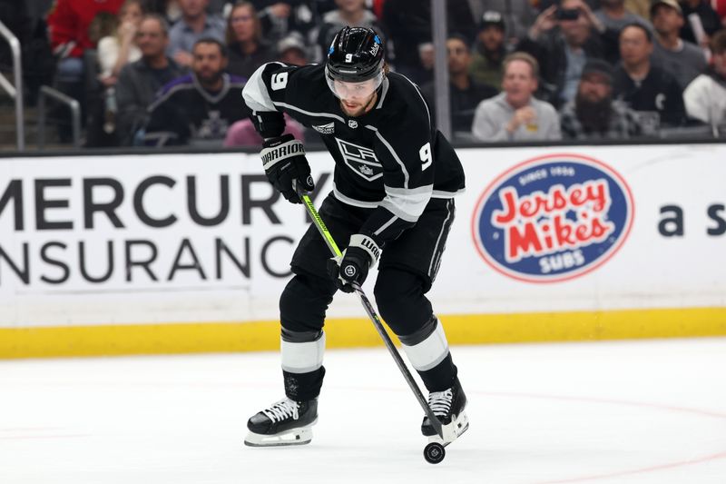 Mar 19, 2024; Los Angeles, California, USA;  Los Angeles Kings right wing Adrian Kempe (9) skates with the puck during the first period against the Chicago Blackhawks at Crypto.com Arena. Mandatory Credit: Kiyoshi Mio-USA TODAY Sports