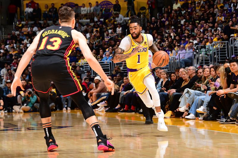 LOS ANGELES, CA - MARCH 18:  D'Angelo Russell #1 of the Los Angeles Lakers goes to the basket during the game on March 18, 2024 at Crypto.Com Arena in Los Angeles, California. NOTE TO USER: User expressly acknowledges and agrees that, by downloading and/or using this Photograph, user is consenting to the terms and conditions of the Getty Images License Agreement. Mandatory Copyright Notice: Copyright 2024 NBAE (Photo by Adam Pantozzi/NBAE via Getty Images)