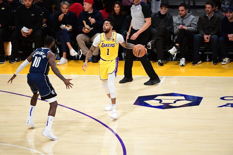 LOS ANGELES, CA - JANUARY 17: D'Angelo Russell #1 of the Los Angeles Lakers handles the ball during the game against the Dallas Mavericks on January 17, 2024 at Crypto.Com Arena in Los Angeles, California. NOTE TO USER: User expressly acknowledges and agrees that, by downloading and/or using this Photograph, user is consenting to the terms and conditions of the Getty Images License Agreement. Mandatory Copyright Notice: Copyright 2024 NBAE (Photo by Adam Pantozzi/NBAE via Getty Images)