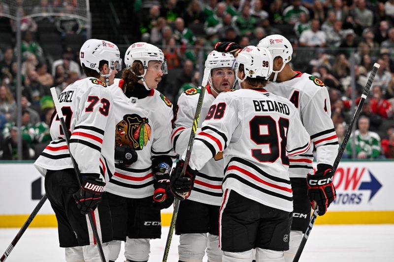 Nov 7, 2024; Dallas, Texas, USA; Chicago Blackhawks left wing Tyler Bertuzzi (59) and left wing Lukas Reichel (73) and center Connor Bedard (98) and center Ryan Donato (8) and defenseman Connor Murphy (5) celebrates a goal scored by Bertuzzi against the Dallas Stars during the third period at the American Airlines Center. Mandatory Credit: Jerome Miron-Imagn Images