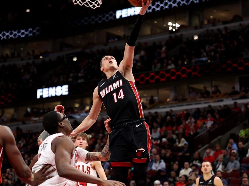 CHICAGO, ILLINOIS - FEBRUARY 04: Tyler Herro #14 of the Miami Heat shoots the ball against the Chicago Bulls during the first quarter at the United Center on February 04, 2025 in Chicago, Illinois. NOTE TO USER: User expressly acknowledges and agrees that, by downloading and or using this photograph, user is consenting to the terms and conditions of the Getty Images License Agreement.  (Photo by Luke Hales/Getty Images)