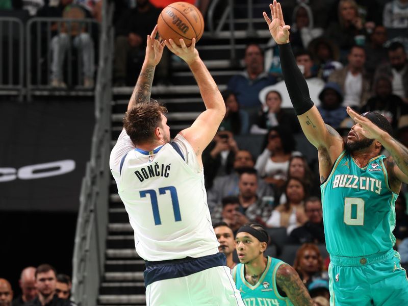 CHARLOTTE, NC - APRIL 9: Luka Doncic #77 of the Dallas Mavericks shoots the ball during the game against the Charlotte Hornets on April 9, 2024 at Spectrum Center in Charlotte, North Carolina. NOTE TO USER: User expressly acknowledges and agrees that, by downloading and or using this photograph, User is consenting to the terms and conditions of the Getty Images License Agreement. Mandatory Copyright Notice: Copyright 2024 NBAE (Photo by Kent Smith/NBAE via Getty Images)