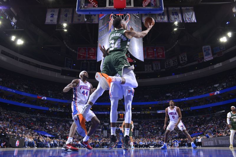 PHILADELPHIA, PA - FEBRUARY 25: Giannis Antetokounmpo #34 of the Milwaukee Bucks drives to the basket during the game against the Philadelphia 76ers on February 25, 2024 at the Wells Fargo Center in Philadelphia, Pennsylvania NOTE TO USER: User expressly acknowledges and agrees that, by downloading and/or using this Photograph, user is consenting to the terms and conditions of the Getty Images License Agreement. Mandatory Copyright Notice: Copyright 2024 NBAE (Photo by Jesse D. Garrabrant/NBAE via Getty Images)