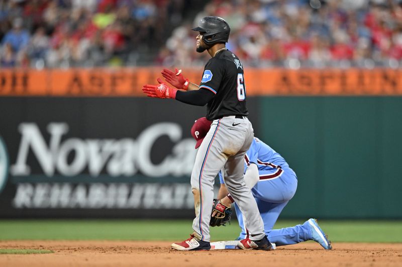 Jun 27, 2024; Philadelphia, Pennsylvania, USA; Miami Marlins infielder Otto Lopez (61) reacts after advancing to second against the Philadelphia Phillies in the eighth inning at Citizens Bank Park. Mandatory Credit: Kyle Ross-USA TODAY Sports