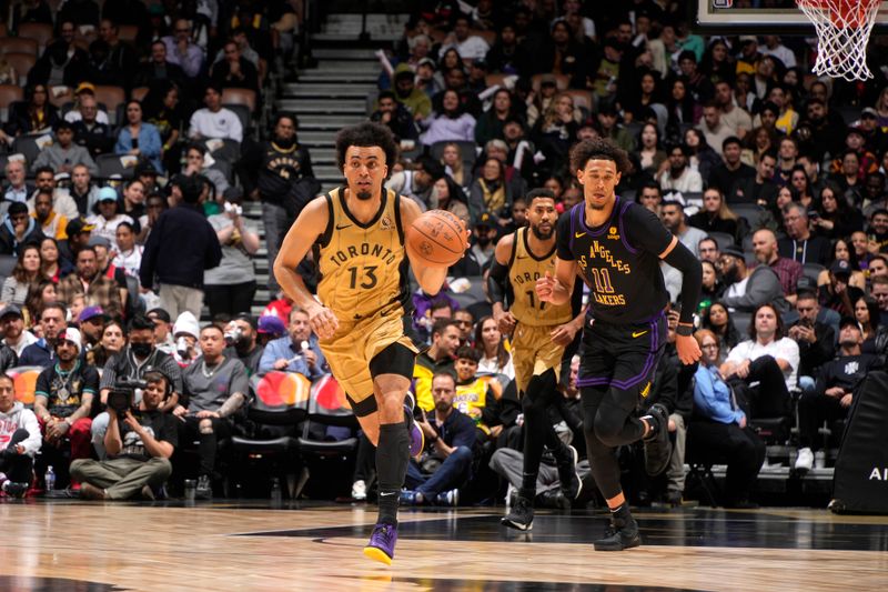 TORONTO, CANADA - APRIL 2: Jordan Nwora #13 of the Toronto Raptors dribbles the ball during the game against the Los Angeles Lakers on April 2, 2024 at the Scotiabank Arena in Toronto, Ontario, Canada.  NOTE TO USER: User expressly acknowledges and agrees that, by downloading and or using this Photograph, user is consenting to the terms and conditions of the Getty Images License Agreement.  Mandatory Copyright Notice: Copyright 2024 NBAE (Photo by Mark Blinch/NBAE via Getty Images)