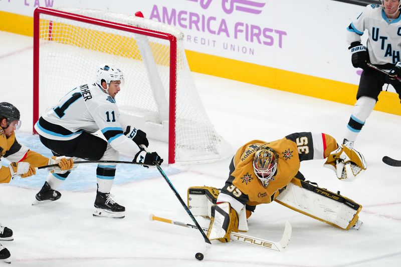 Nov 30, 2024; Las Vegas, Nevada, USA; Utah Hockey Club right wing Dylan Guenther (11) tips the puck away from Vegas Golden Knights goaltender Ilya Samsonov (35) during the second period at T-Mobile Arena. Mandatory Credit: Stephen R. Sylvanie-Imagn Images
