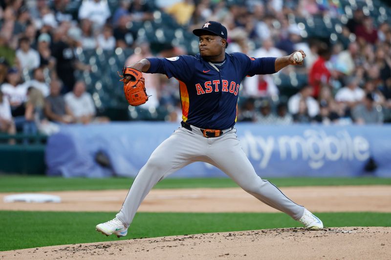 Jun 18, 2024; Chicago, Illinois, USA; Houston Astros starting pitcher Framber Valdez (59) delivers a pitch against the Chicago White Sox during the first inning at Guaranteed Rate Field. Mandatory Credit: Kamil Krzaczynski-USA TODAY Sports