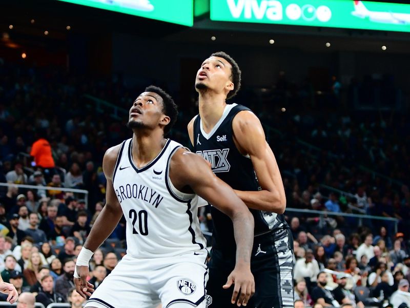 AUSTIN, TX - MARCH 17: Victor Wembanyama #1 of the San Antonio Spurs and Day'Ron Sharpe #20 of the Brooklyn Nets box out during the game on March 17, 2024 at the Moody Center in Austin, Texas. NOTE TO USER: User expressly acknowledges and agrees that, by downloading and or using this photograph, user is consenting to the terms and conditions of the Getty Images License Agreement. Mandatory Copyright Notice: Copyright 2024 NBAE (Photos by Michael Gonzales/NBAE via Getty Images)