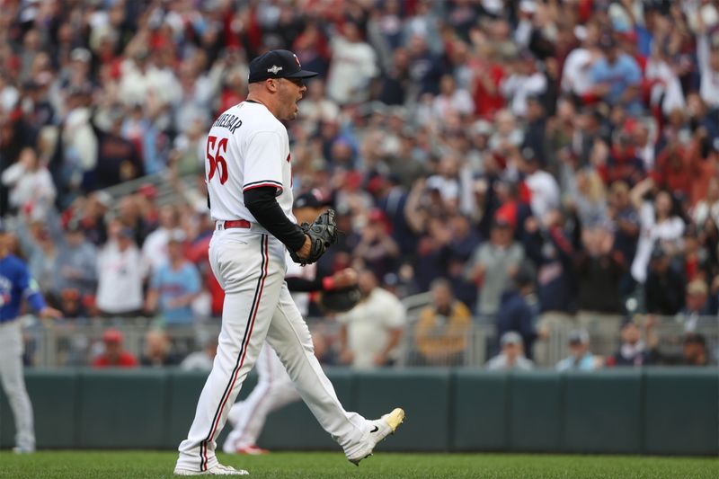 Oct 4, 2023; Minneapolis, Minnesota, USA; Minnesota Twins relief pitcher Caleb Thielbar (56) celebrates double play in the sixth inning against the Toronto Blue Jays  during game two of the Wildcard series for the 2023 MLB playoffs at Target Field. Mandatory Credit: Jesse Johnson-USA TODAY Sports