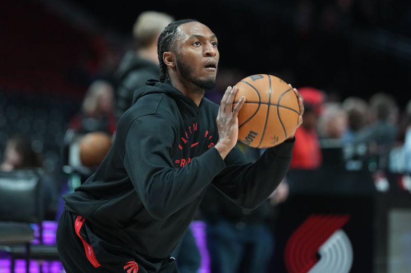 PORTLAND, OREGON - MARCH 16: Immanuel Quickley #5 of the Toronto Raptors warms up before the game against the Portland Trail Blazers at Moda Center on March 16, 2025 in Portland, Oregon. NOTE TO USER: User expressly acknowledges and agrees that, by downloading and or using this photograph, User is consenting to the terms and conditions of the Getty Images License Agreement. (Photo by Soobum Im/Getty Images)