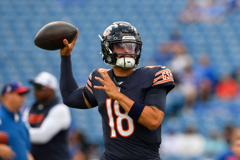 Chicago Bears quarterback Caleb Williams throws before an preseason NFL football game against the Buffalo Bills, Saturday, Aug. 10, 2024, in Orchard Park, NY. (AP Photo/Adrian Kraus)