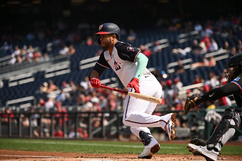 Sep 15, 2024; Washington, District of Columbia, USA; Washington Nationals second baseman Luis Garcia Jr. (2) runs to first base after laying down a bunt against the Miami Marlins during the first inning at Nationals Park. Mandatory Credit: Rafael Suanes-Imagn Images