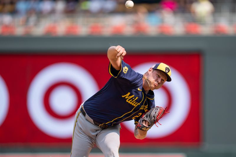 Jul 21, 2024; Minneapolis, Minnesota, USA; Milwaukee Brewers pitcher Trevor Megill (29) pitches in the ninth inning against the Minnesota Twins at Target Field. Mandatory Credit: Matt Blewett-USA TODAY Sports
