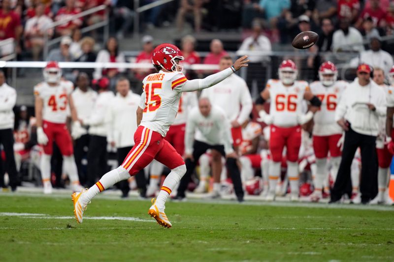 Kansas City Chiefs quarterback Patrick Mahomes passes during the first half of an NFL football game against the Las Vegas Raiders Sunday, Oct. 27, 2024, in Las Vegas. (AP Photo/John Locher)