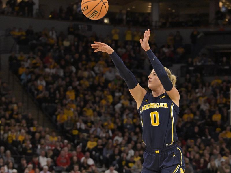 Mar 9, 2024; Minneapolis, MN, USA;  Michigan Wolverines guard Elissa Brett (0) shoots a three-pointer against the Iowa Hawkeyes during the first half of a Big Ten Women's Basketball tournament semifinal at Target Center. Mandatory Credit: Nick Wosika-USA TODAY Sports