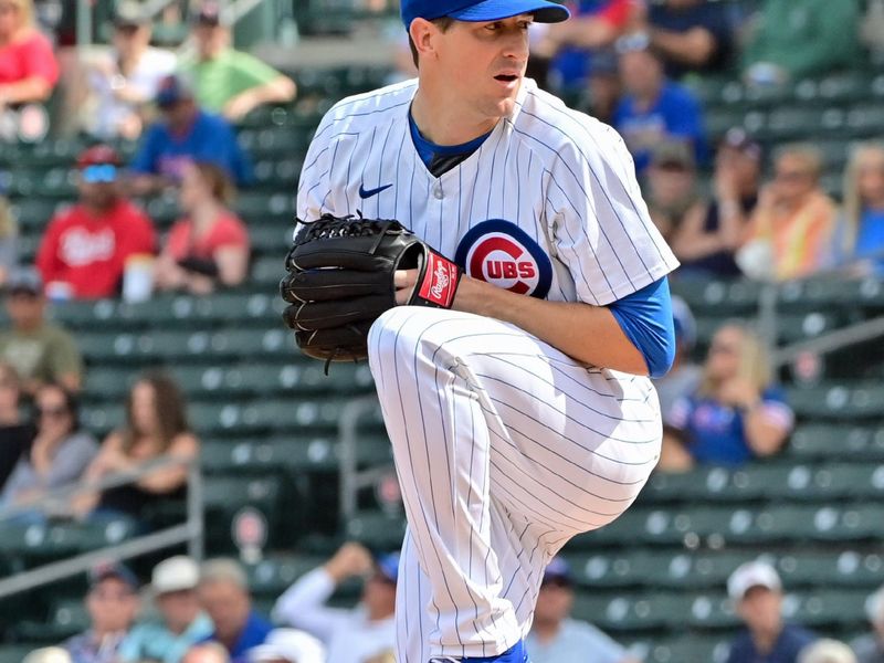 Feb 27, 2024; Mesa, Arizona, USA;  Chicago Cubs starting pitcher Kyle Hendricks (28) throws in the first inning against the Cincinnati Reds during a spring training game at Sloan Park. Mandatory Credit: Matt Kartozian-USA TODAY Sports