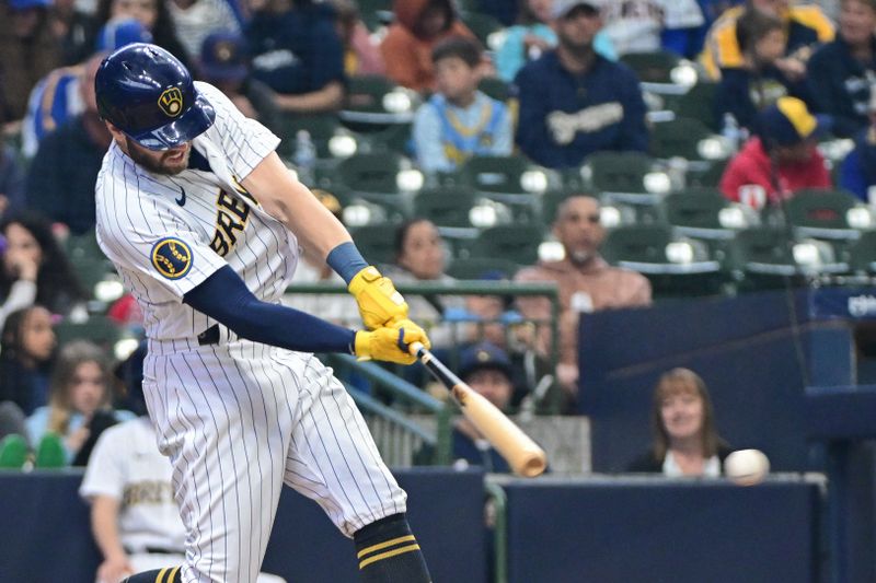 Jun 11, 2023; Milwaukee, Wisconsin, USA; Milwaukee Brewers first baseman Owen Miller (6) hits a double to drive in a run against the Oakland Athletes in the third inning at American Family Field. Mandatory Credit: Benny Sieu-USA TODAY Sports