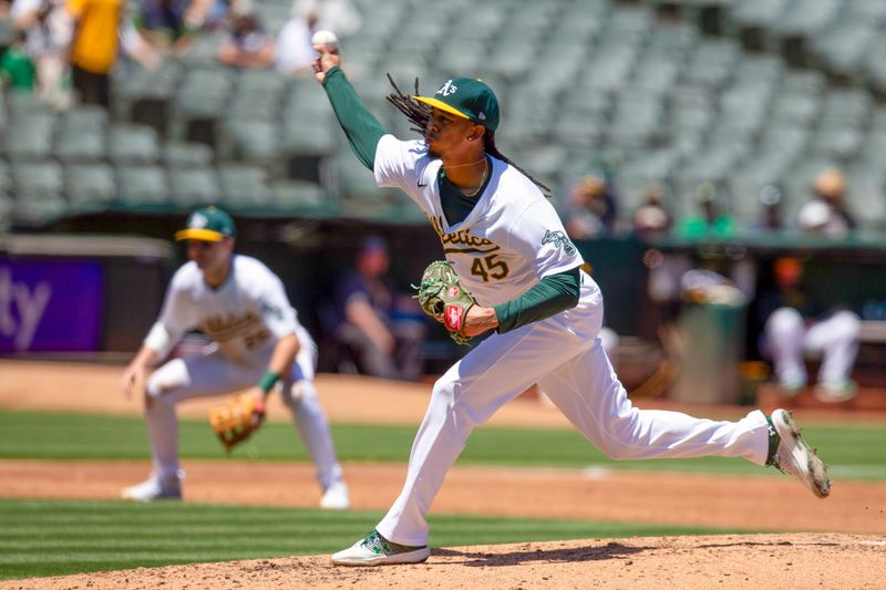 Jun 22, 2024; Oakland, California, USA; Oakland Athletics pitcher Osvaldo Bido (45) delivers a pitch against the Minnesota Twins during the second inning at Oakland-Alameda County Coliseum. Mandatory Credit: D. Ross Cameron-USA TODAY Sports