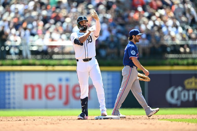 May 11, 2025; Detroit, Michigan, USA; Detroit Tigers left fielder Riley Greene (31) celebrates after hitting a double against the Texas Rangers in the third inning at Comerica Park. Mandatory Credit: Lon Horwedel-Imagn Images