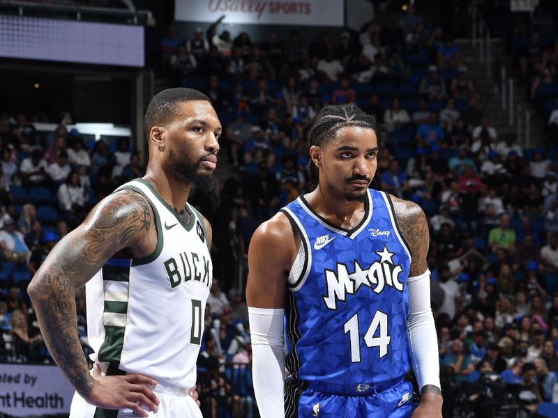 ORLANDO, FL - APRIL 14: Damian Lillard #0 of the Milwaukee Bucks and Gary Harris #14 of the Orlando Magic looks on during the game on April 14, 2024 at Kia Center in Orlando, Florida. NOTE TO USER: User expressly acknowledges and agrees that, by downloading and or using this photograph, User is consenting to the terms and conditions of the Getty Images License Agreement. Mandatory Copyright Notice: Copyright 2024 NBAE (Photo by Fernando Medina/NBAE via Getty Images)