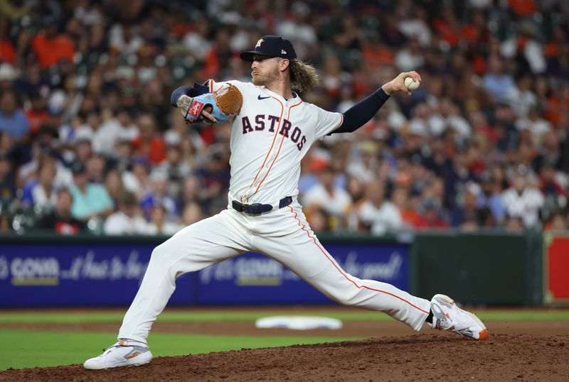 Apr 15, 2024; Houston, Texas, USA; Houston Astros Josh Hader (71) pitches against the Atlanta Braves in the ninth inning at Minute Maid Park. All players wore #42 in honor of Jackie Robinson Day.  Mandatory Credit: Thomas Shea-USA TODAY Sports