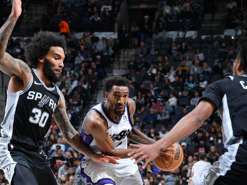 SAN ANTONIO, TX - DECEMBER 6:  Malik Monk #0 of the Sacramento Kings handles the ball during the game against the San Antonio Spurs on December 6, 2024 at the Frost Bank Center in San Antonio, Texas. NOTE TO USER: User expressly acknowledges and agrees that, by downloading and or using this photograph, user is consenting to the terms and conditions of the Getty Images License Agreement. Mandatory Copyright Notice: Copyright 2024 NBAE (Photos by Michael Gonzales/NBAE via Getty Images)