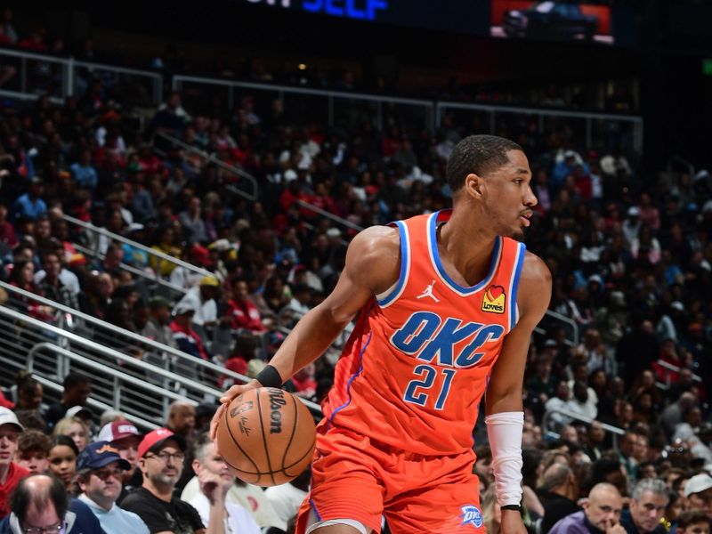 ATLANTA, GA - FEBRUARY 28: Aaron Wiggins #21 of the Oklahoma City Thunder handles the ball during the game against the Atlanta Hawks on February 28, 2025 at State Farm Arena in Atlanta, Georgia.  NOTE TO USER: User expressly acknowledges and agrees that, by downloading and/or using this Photograph, user is consenting to the terms and conditions of the Getty Images License Agreement. Mandatory Copyright Notice: Copyright 2025 NBAE (Photo by Scott Cunningham/NBAE via Getty Images)