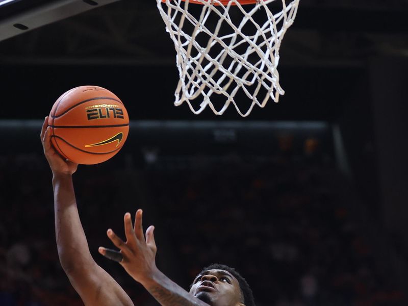 Jan 17, 2026; Knoxville, Tennessee, USA;  Kentucky Wildcats guard Otega Oweh (00) scores a basket to put the Kentucky Wildcats in the lead during the second half against the Tennessee Volunteers at Thompson-Boling Arena at Food City Center. Mandatory Credit: Randy Sartin-Imagn Images